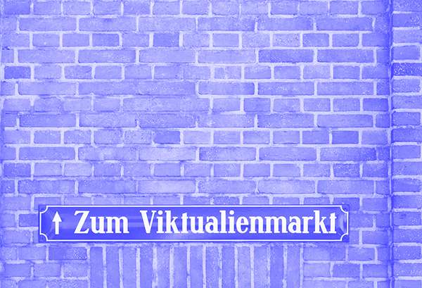 Straßenschild auf Backsteinmauer, Zum Viktualienmarkt